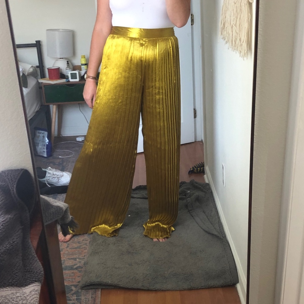 Shiny gold flare pants